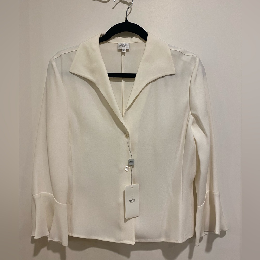 Brand new with tags Armani silk blouse with ruffled sleeves. Size 8